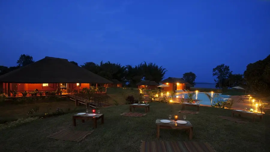 an image of Red Earth Resort which is well lit in the evening at a pet friendly resort in Kabini