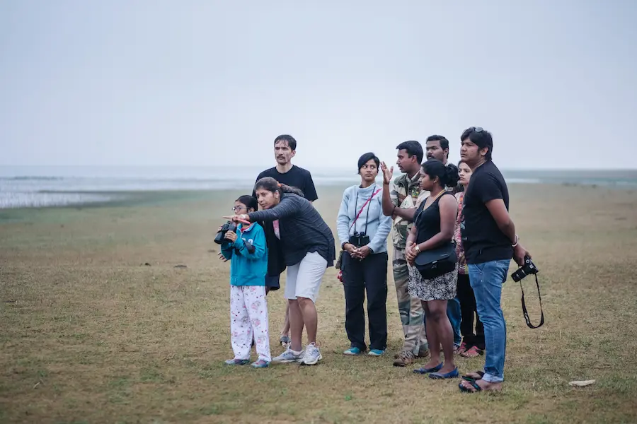 An image of a morning walk to kabini backwaters experiencing while staying at a pet friendly resort in Kabini